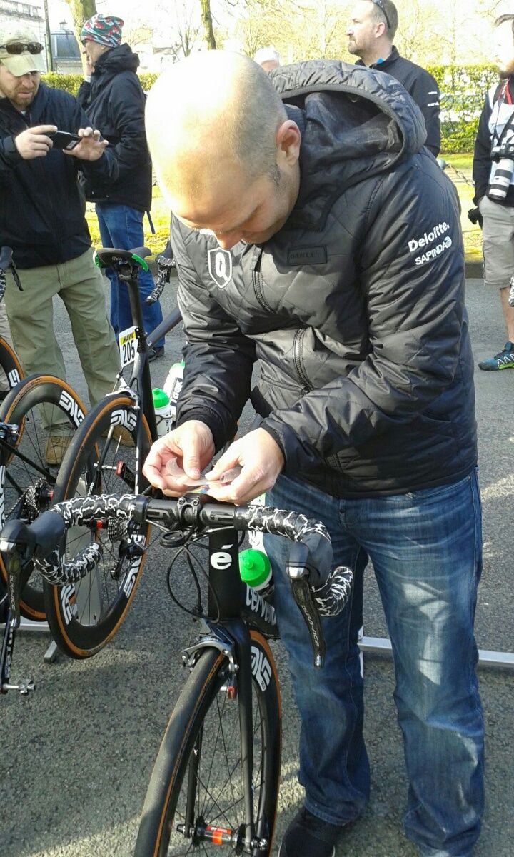Roger Hammond puts the list of cobbled sectors onto the bikes of his riders