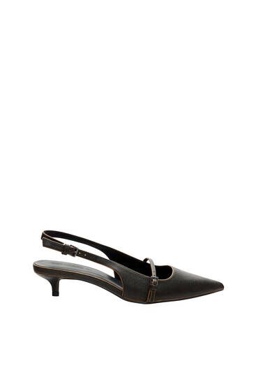 Distressed kitten-heel shoes