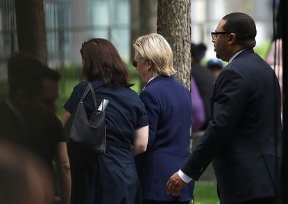 Hillary Clinton leaves the 9/11 memorial service in NYC