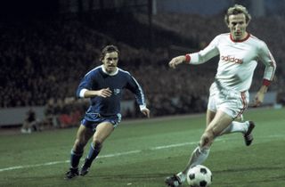 Georg Schwarzenbeck on the ball for Bayern Munich against Bochum in 1975/76.