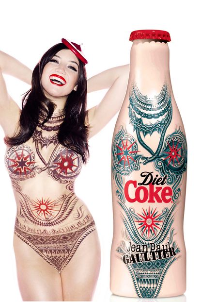 Daisy Lowe poses as a Jean Paul Gaultier decorated Diet Coke bottle