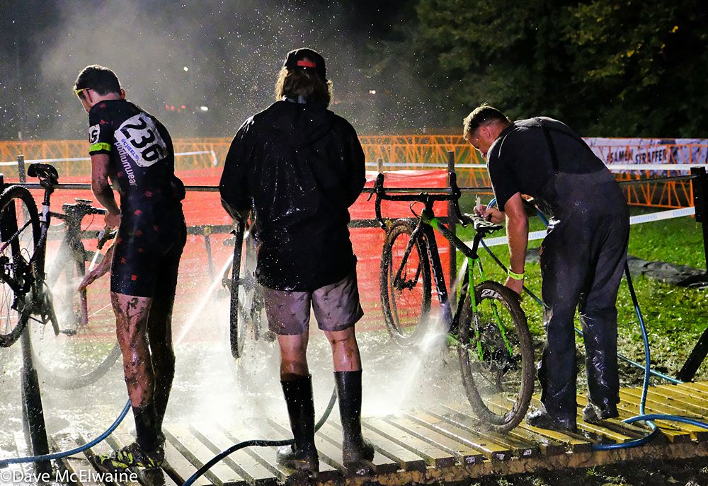 Mechanics cleaning off bikes