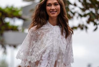 Woman in white lace blouse