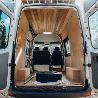 van makeover with wooden interior and wheels