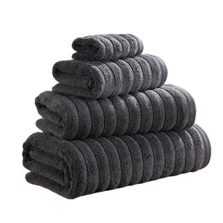 Stack of dark grey bath towels