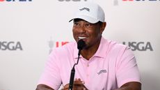 Tiger Woods talks to the media before the US Open