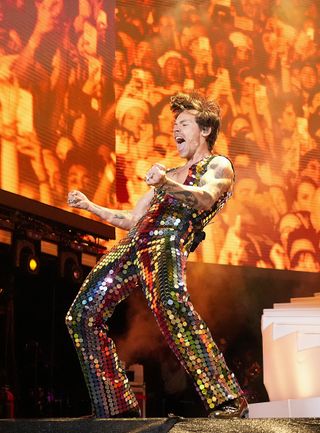 Best Coachella Fashion Looks | Harry Styles performs onstage at the Coachella Stage during the 2022 Coachella Valley Music And Arts Festival on April 15, 2022 in Indio, California