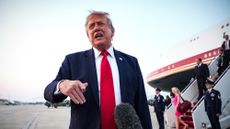 President Donald Trump speaks to reporters after FIFA World Cup game