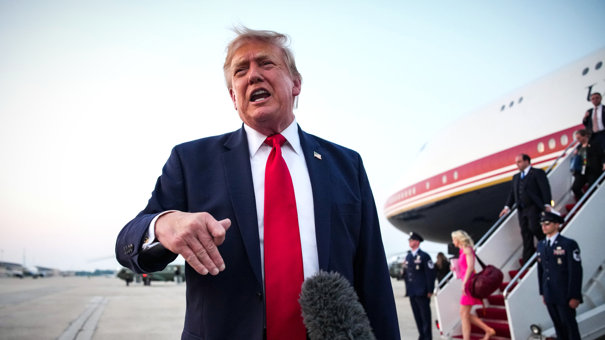 President Donald Trump speaks to reporters after FIFA World Cup game
