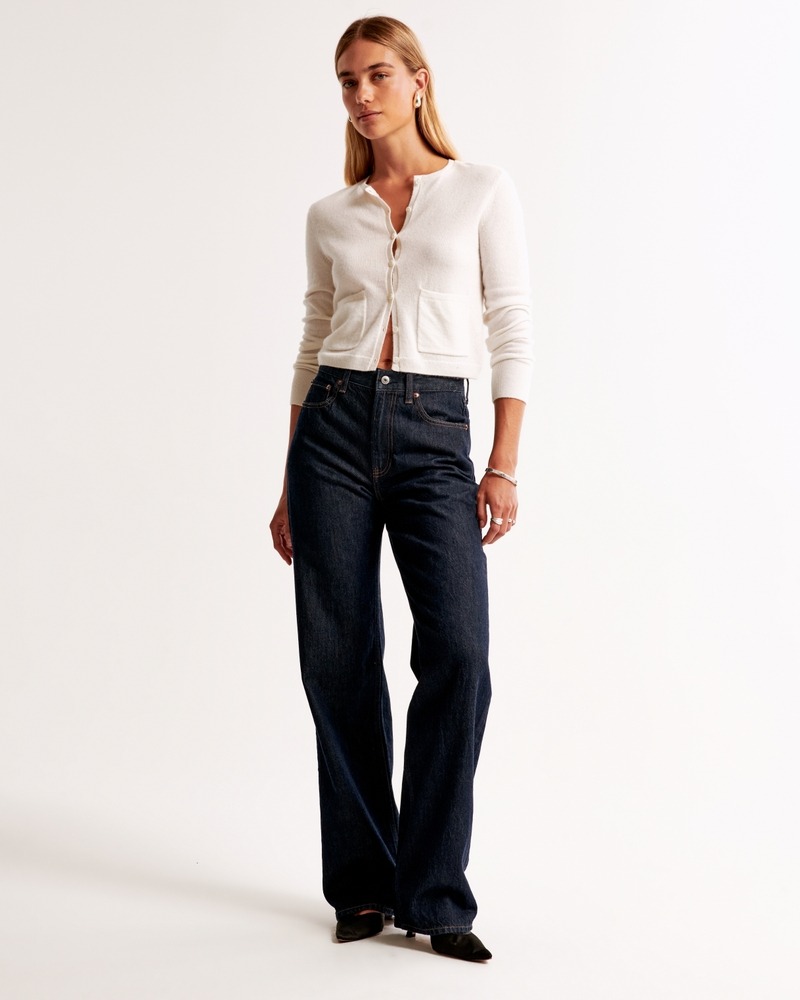close upshot of Abercrombie &amp;amp; Fitch wearing blue jeans and black heels