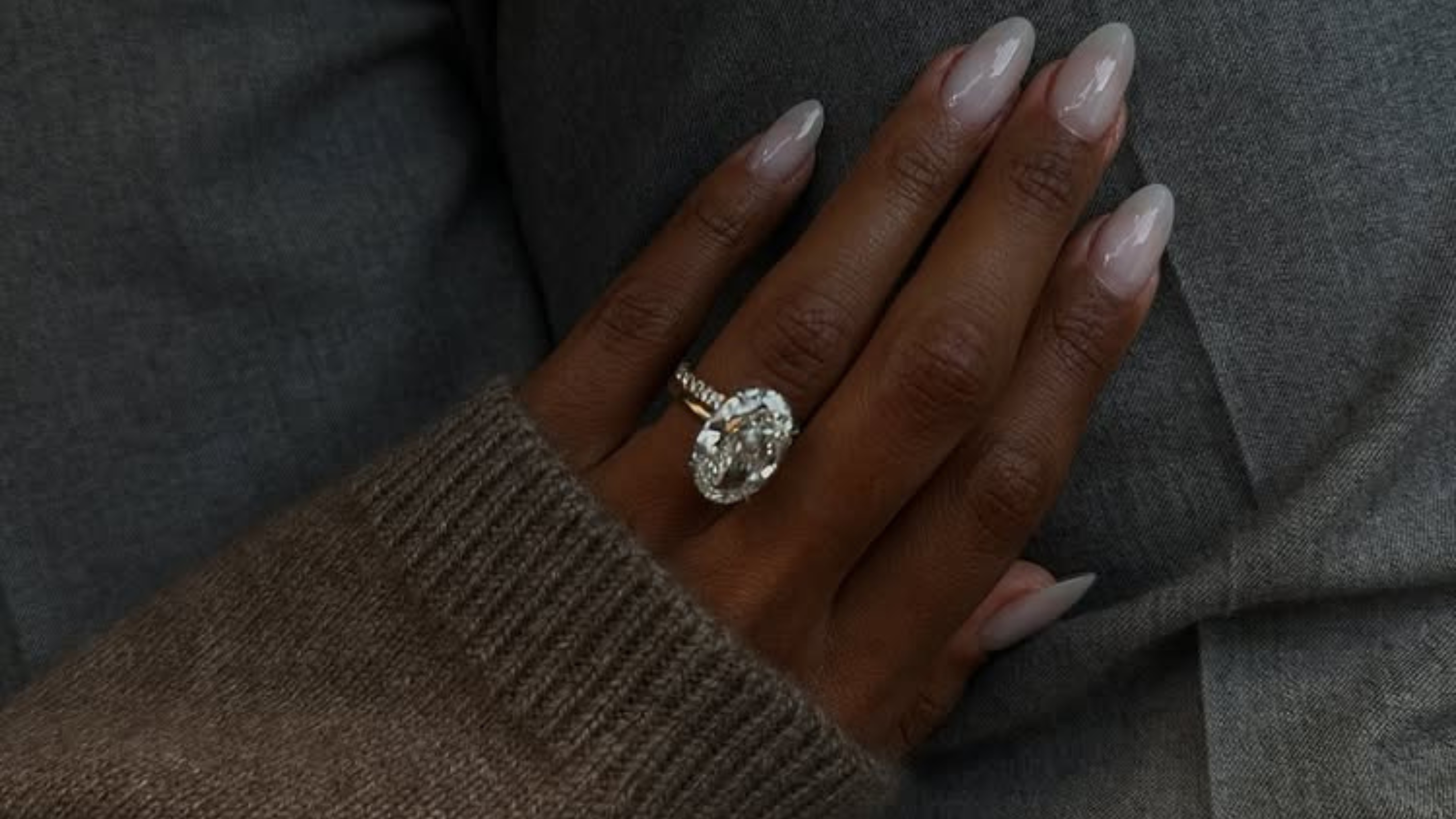 @jastookes wears a diamond engagement ring