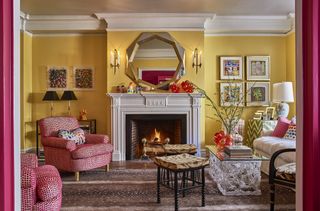 Yellow living room with metallic ceiling by Phillip Thomas