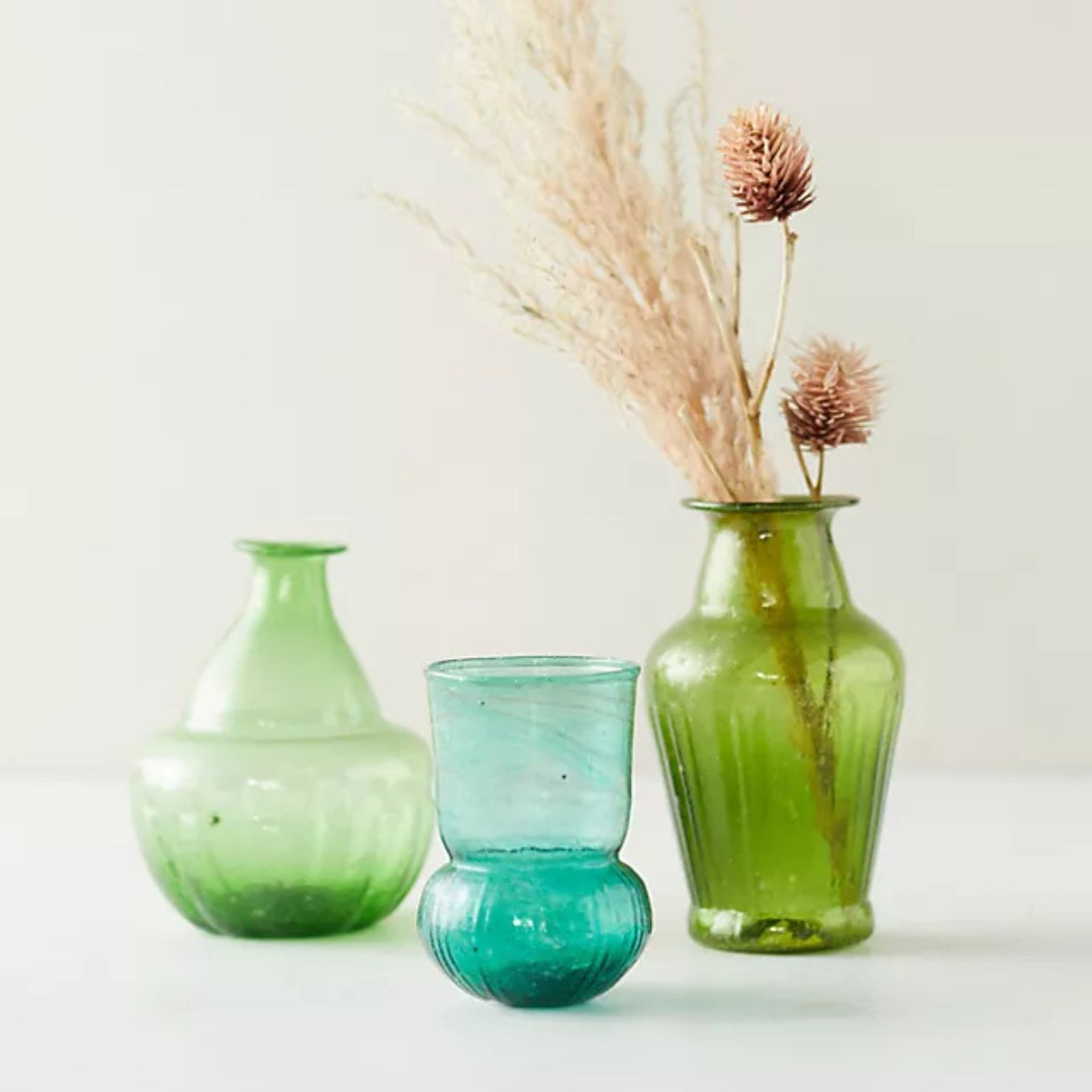 Anthropologie recycled glass bud vases in blue and green
