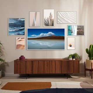 samsung frame tv displaying artwork in open plan living area