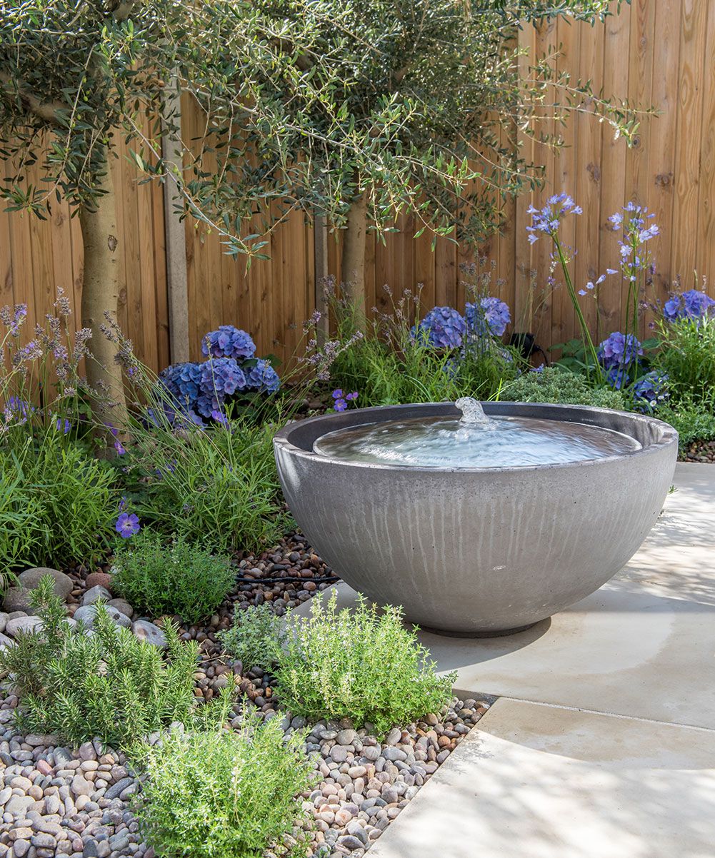 modern stone bowl pond with bubble fountain effect