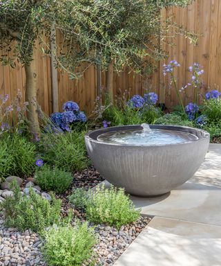 modern stone bowl pond with bubble fountain effect