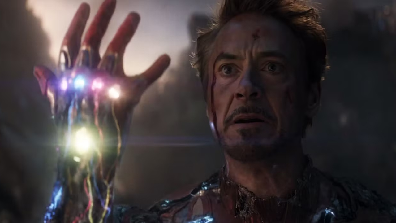 Tony Stark holding the Infinity Stones in his armored right hand in Avengers: Endgame