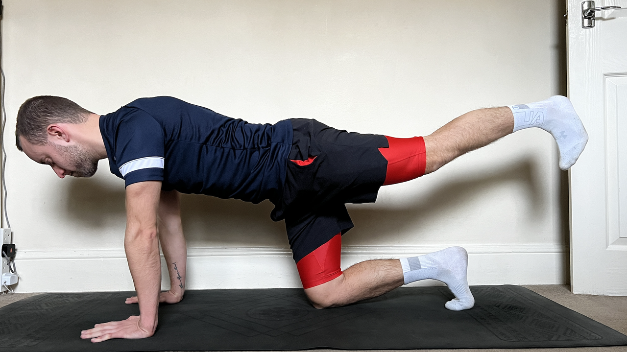 James Frew performing a Pilates workout