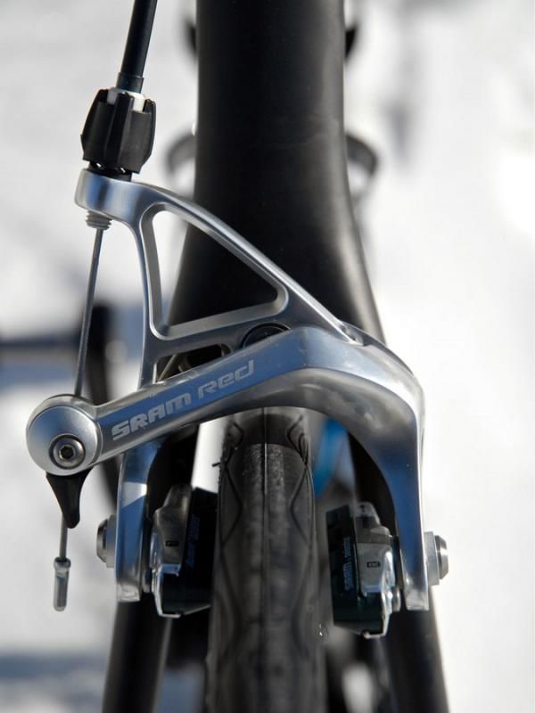 Standard SRAM Red brake calipers are fitted at either end.