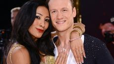 Karen Hauer and Kevin Clifton attend the red carpet launch for "Strictly Come Dancing" at Elstree Studios on September 3, 2013 in Borehamwood, England