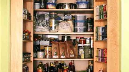 kitchen wooden larder with food items