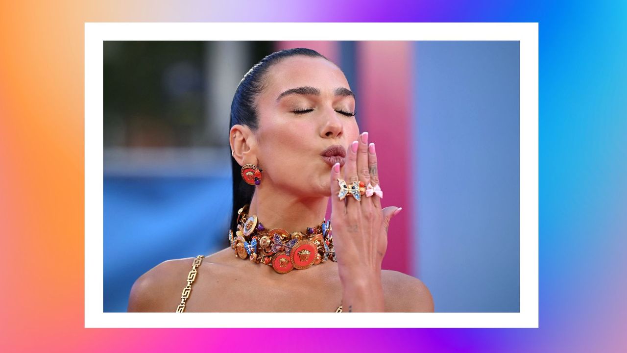 English singer-songwriter Dua Lipa blows a kiss on the pink carpet upon arrival for the European premiere of &quot;Barbie&quot; in central London on July 12, 2023. 