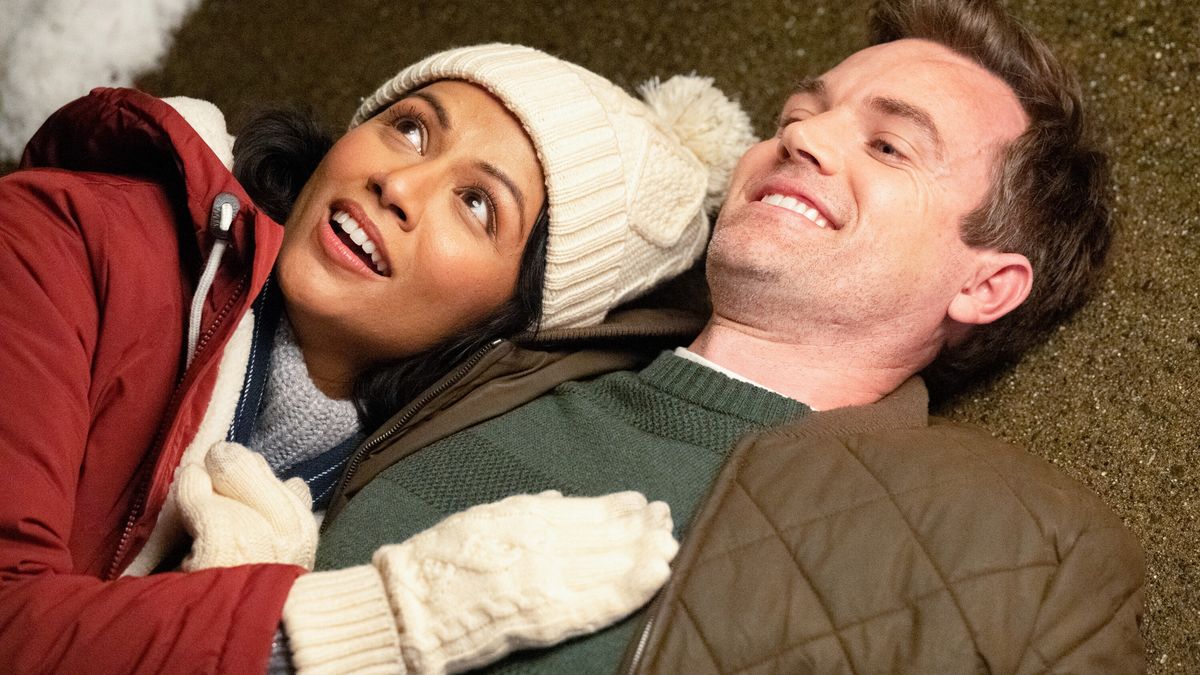 Karen David as Melody Douglass and Tyler Hilton as Luke Dawson in When Christmas Was Young