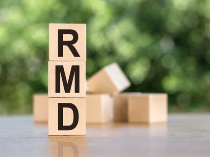 RMD spelled on a stack of wooden blocks