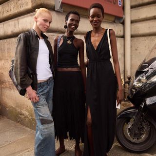 models smiling at paris fashion week