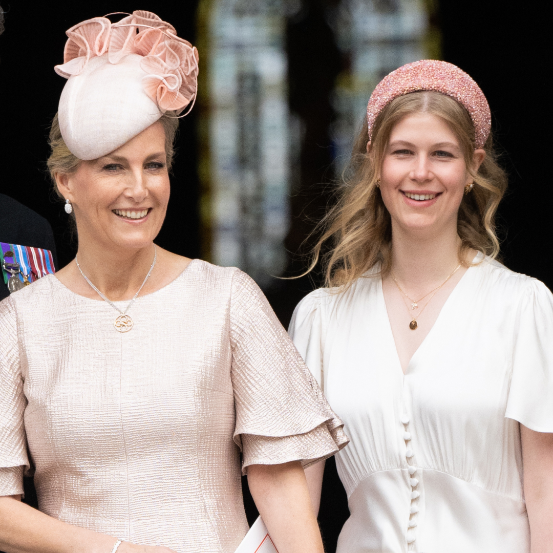 Duchess Sophie and Lady Louise wearing pink dresses and hats smiling at the Platinum Jubilee in 2022