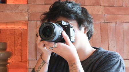 A black Sony A7 V mirrorless full frame camera