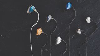 A line up of Fender in-ear monitors