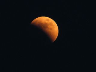 Skywatcher and photographer David Paleino snapped this view of the total lunar eclipse of June 15, 2011 from Italy using a Fujifilm FinePix S2000HD camera.