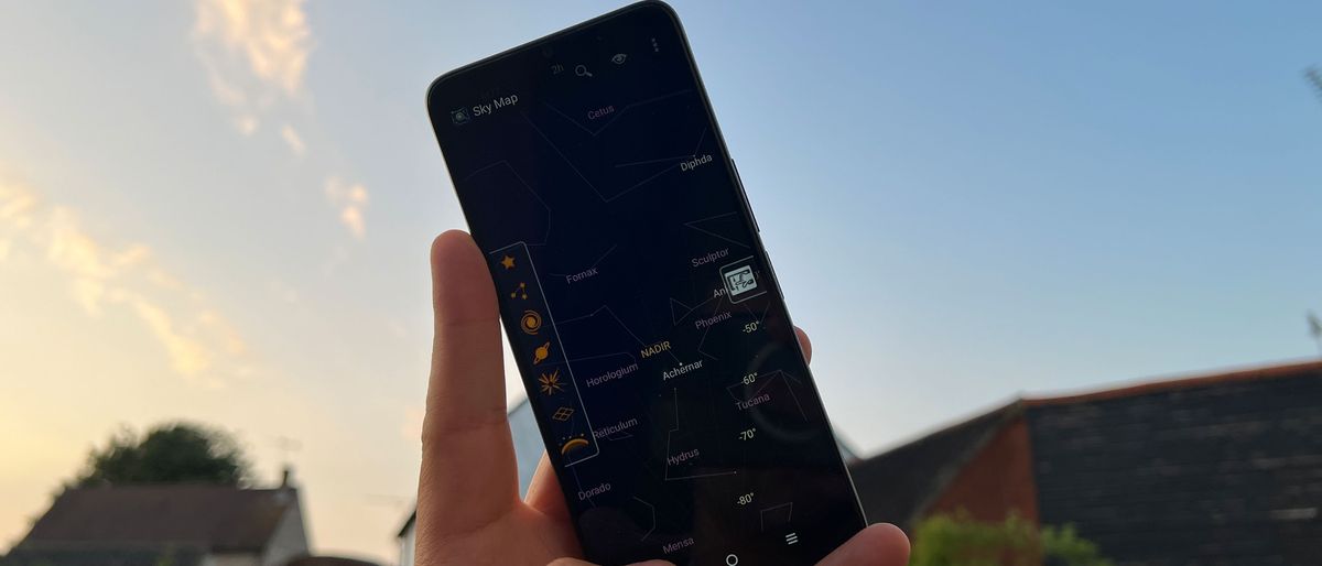 Sky Map app open on a smartphone pointed towards a dusky sky.