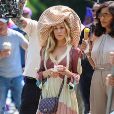 SJP Carrie Bradshaw wearing a vintage Ossie Clark dress and Maryam Keyhani hat