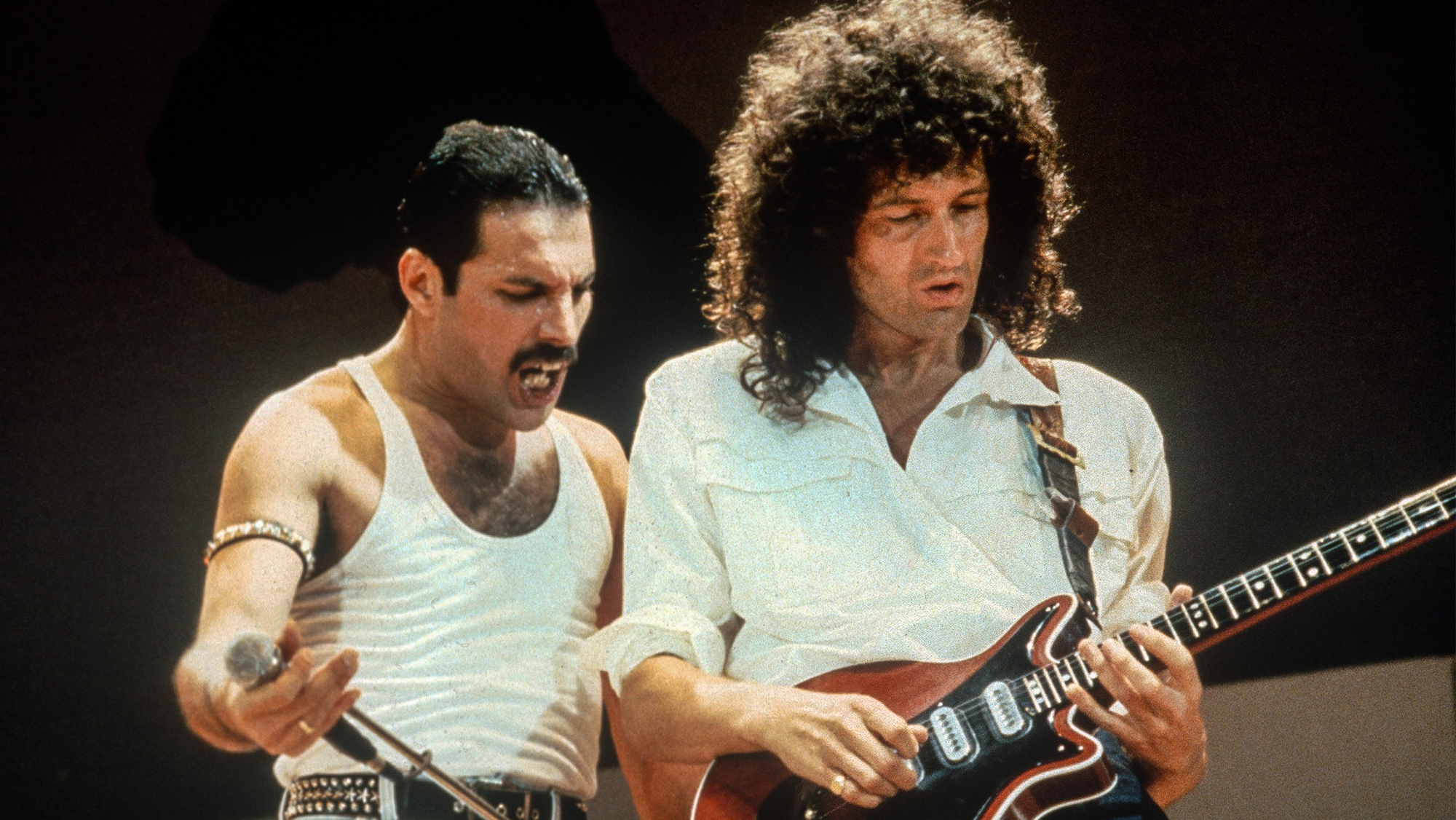 Freddie Mercury and Brian May of the band Queen at Live Aid on July 13, 1985 in London, United Kingdom.