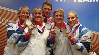 Great Britain's Eventing Team (L-R) Mary King, Nicola Wilson, William Fox-Pitt, Kristina Cook and Zara Phillips show off their silver medals during a press conference on Day 4 of the London 2012 Olympic Games