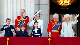 Prince George of Wales, Prince William, Prince of Wales (Colonel of the Welsh Guards), Prince Louis of Wales, Princess Charlotte of Wales, Catherine, Princess of Wales, King Charles III, wearing his Irish Guards uniform, and Queen Camilla watch an RAF flypast from the balcony of Buckingham Palace after attending Trooping the Colour on June 15, 2024