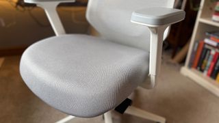 A close up of the cushion seat of the Ergonomic Chair Pro.