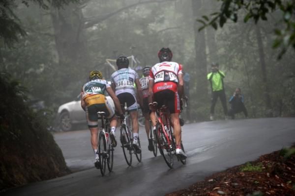 Unfortunately the rain wasn't done with the riders, as the breakaway group discovered here on one of the earlir climbs.
