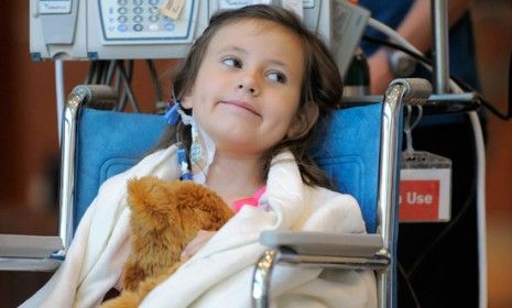 Sierra Jane Downing smiles during a news conference about her recover from bubonic plague, which doctors suspect she contracted while burying a dead squirrel during a camping trip.