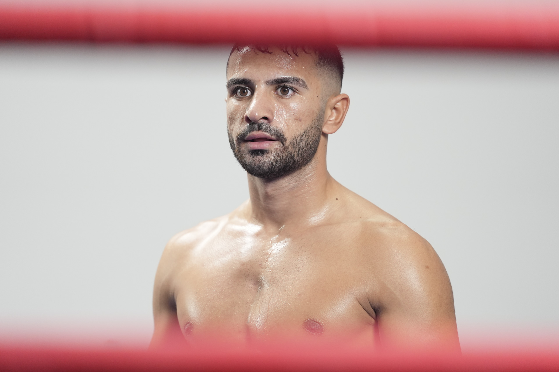 Portrait of a sweaty Olympic athlete in the ring during a training session