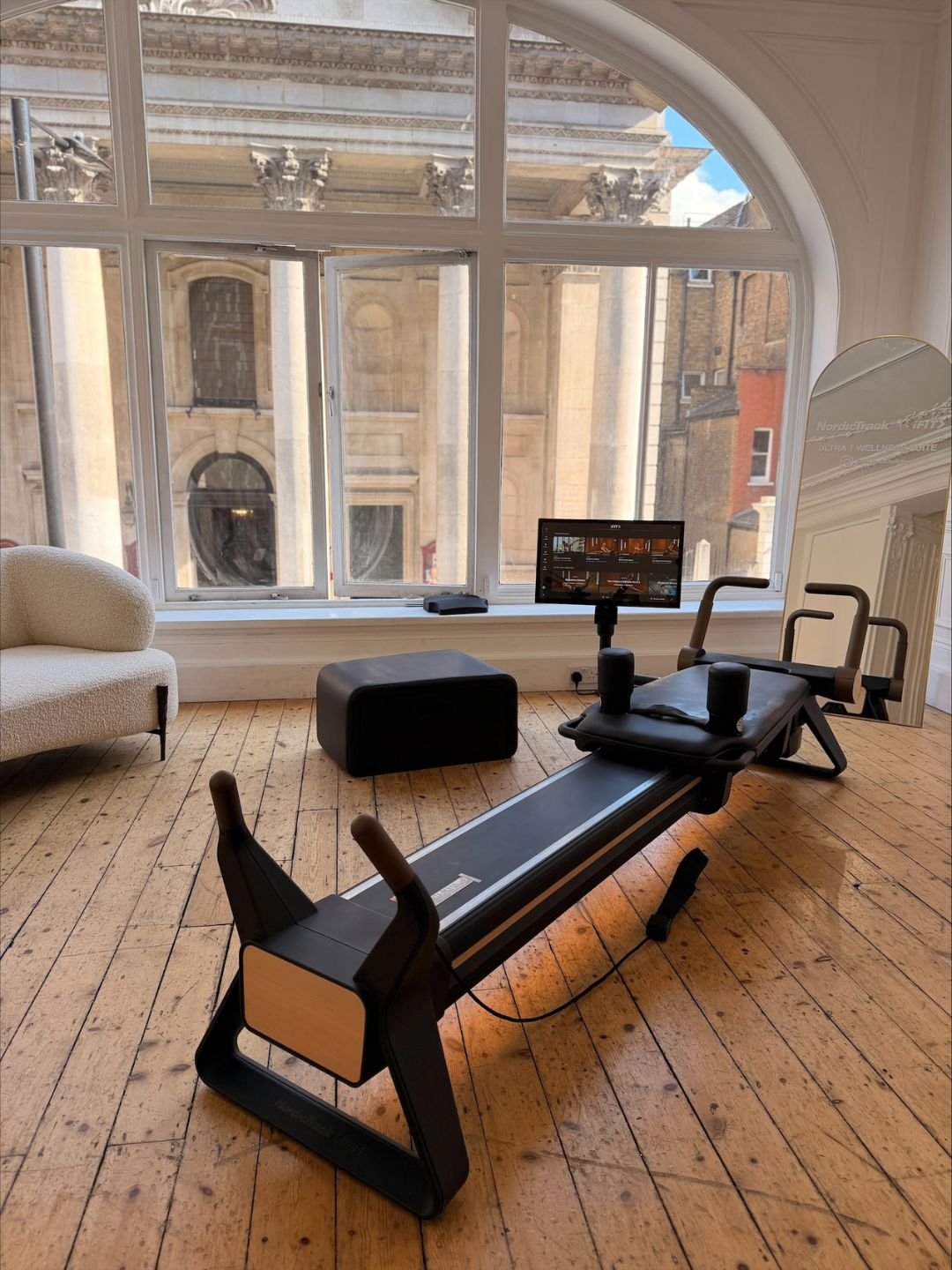Health freelancer Anna Bartter trying NordicTrack Ultra 1 Reformer Pilates Machine