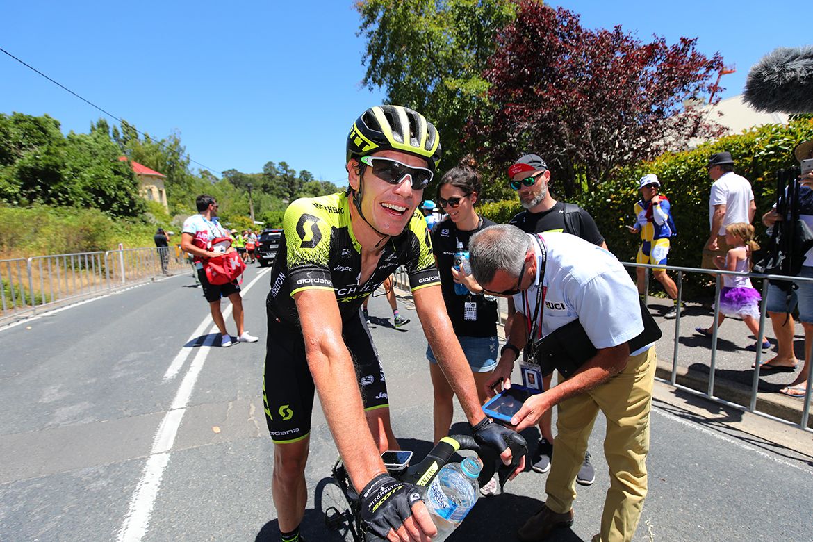Daryl Impey gets his bike checked for a motor after finishing second