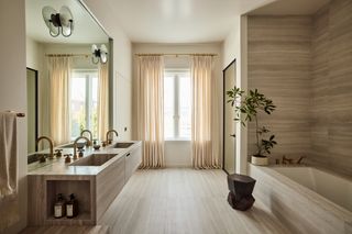 A bathroom with soft curtains
