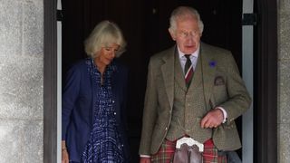 King Charles III and Queen Camilla depart Crathie Parish Church following a church service to mark the first anniversary of the death of Queen Elizabeth II