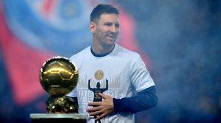 Lionel Messi of PSG with the Ballon d'Or trophy, December 2021