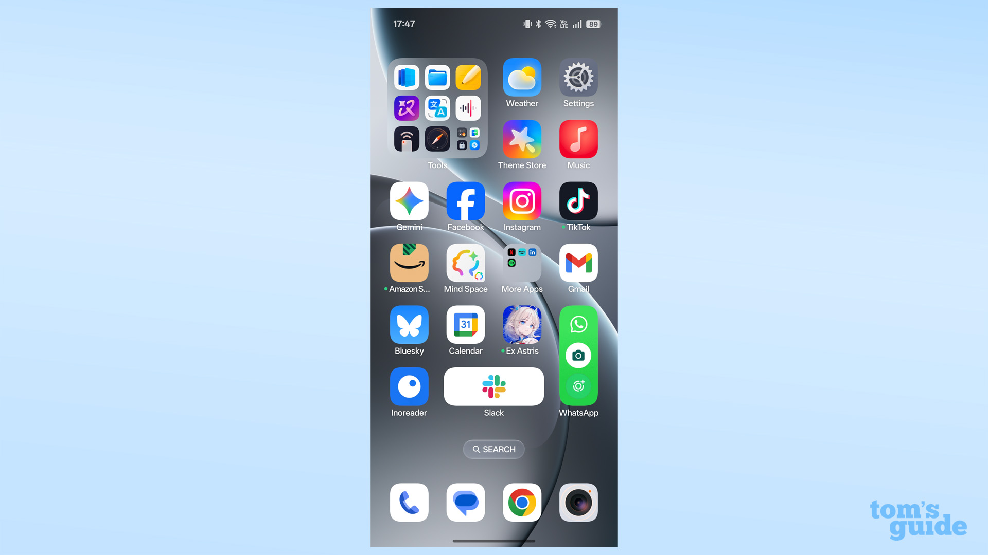 Oppo Find X9 home screen with a 2x2 folder in one corner and two 1 x 2 app icons for Slack and Whatsapp in another