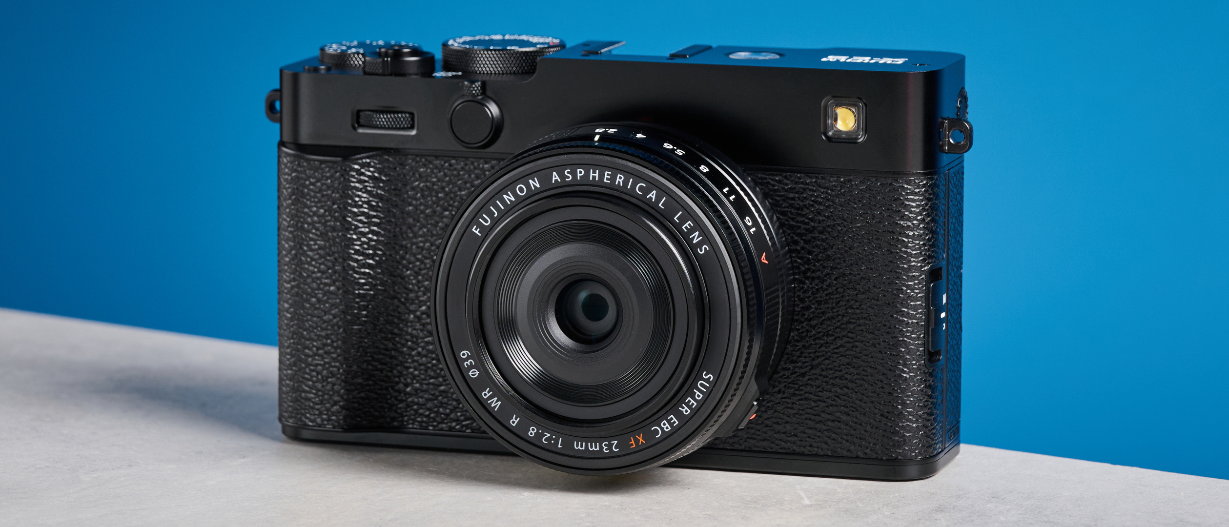 Fujifilm X-E5 against a blue background