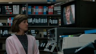 Holly Hunter previews a news tape in Broadcast News